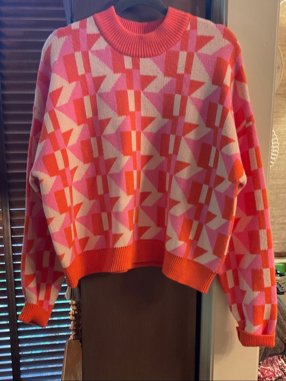 Wonderful, orange pink and cream sweater. Never worn mint condition, XL.